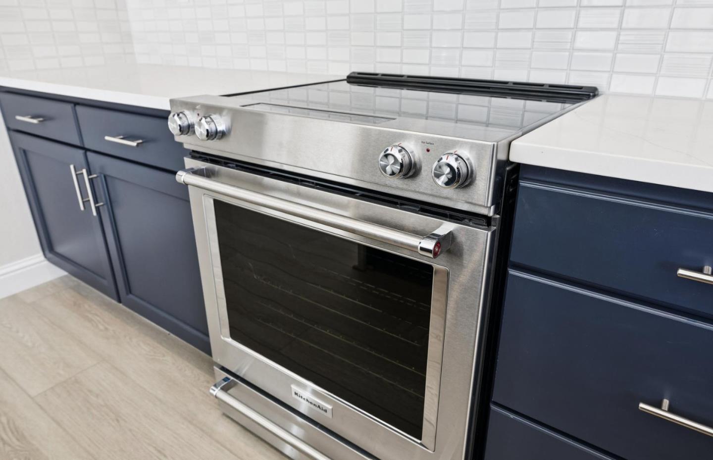 2425 Willow Way San Mateo, CA 94403 - Photo 9 of 39 a stove top oven sitting inside of a kitchen