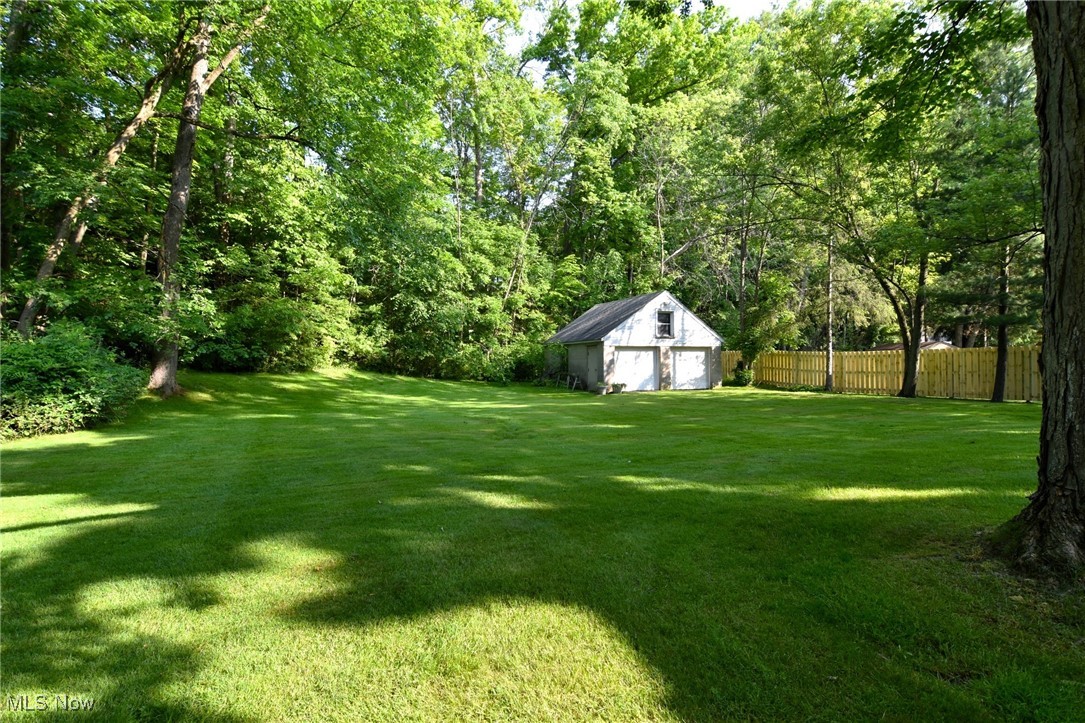 272 Miles Road Chagrin Falls, OH 44022 - Photo 5 of 22 View of yard with an outdoor structure and a garage