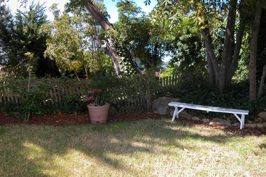 711 Moreno Road Santa Barbara, CA 93103 - Photo 13 of 18 a backyard of a house with lots of green space
