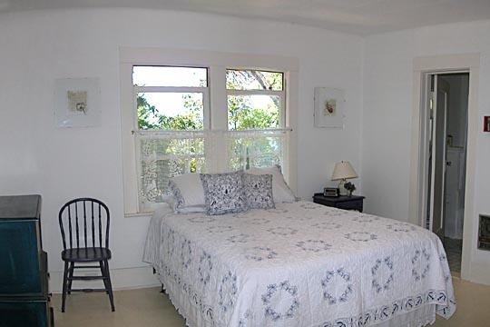 711 Moreno Road Santa Barbara, CA 93103 - Photo 8 of 18 a bedroom with a bed and a window