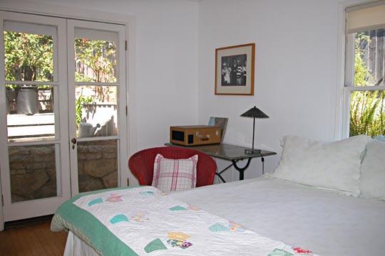 711 Moreno Road Santa Barbara, CA 93103 - Photo 10 of 18 a bedroom with a bed and a window