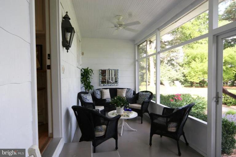 6857 Edge Creek Road St. Michaels, MD 21663 - Photo 4 of 13 a dining room with furniture window and outside view