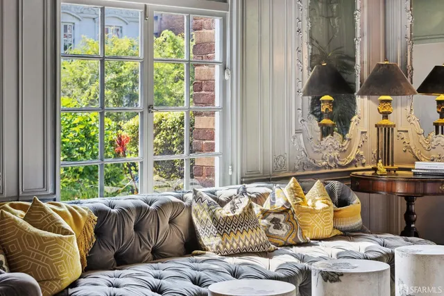 a view of a dining room with furniture window and outside view