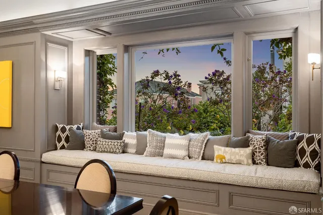 a hallway with a sink and a microwave