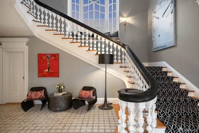 a view of a livingroom with furniture and front door
