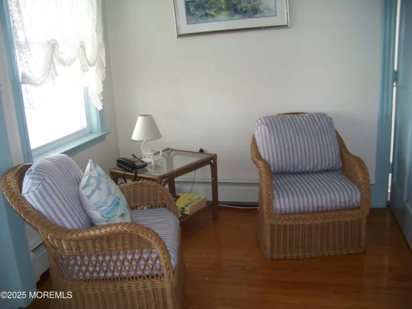 a bedroom with a bed and a table in it
