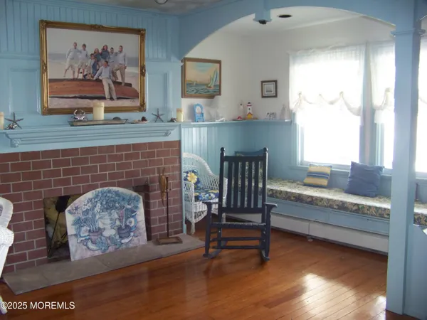 a kitchen with a white cabinets and refrigerator