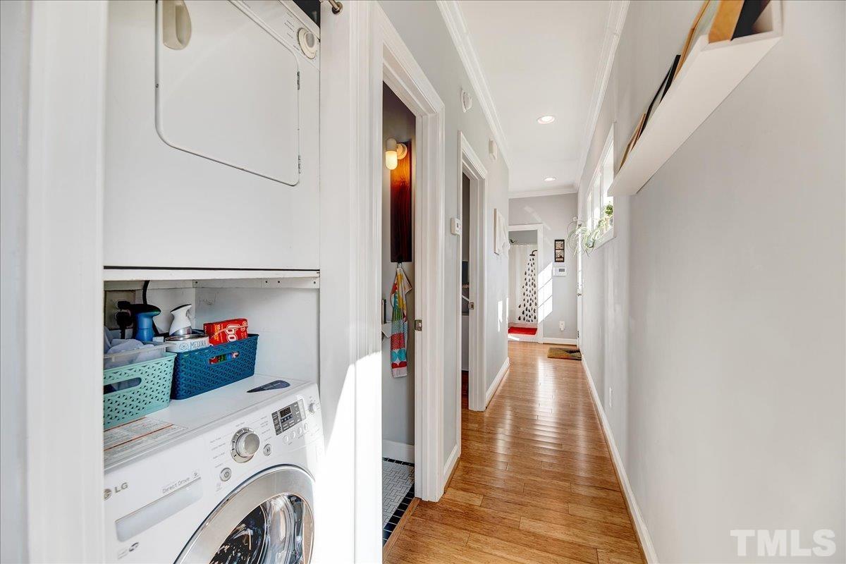800 Hartford Road Raleigh, NC 27610 - Photo 14 of 28 a view of a hallway with washer and dryer