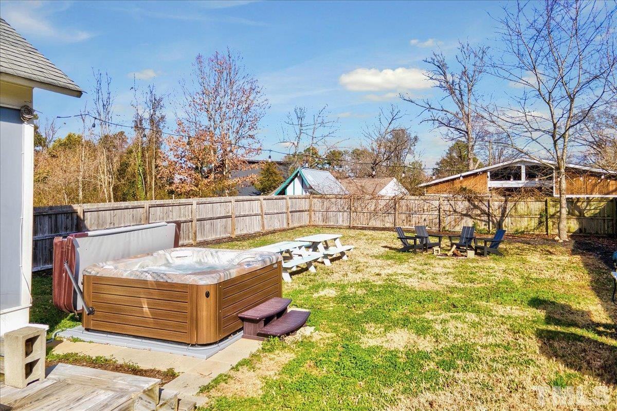 800 Hartford Road Raleigh, NC 27610 - Photo 23 of 28 a view of swimming pool with outdoor seating