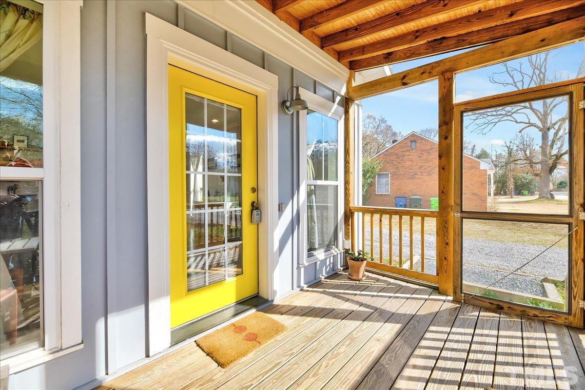 800 Hartford Road Raleigh, NC 27610 - Photo 4 of 28 a view of a door and wooden floor