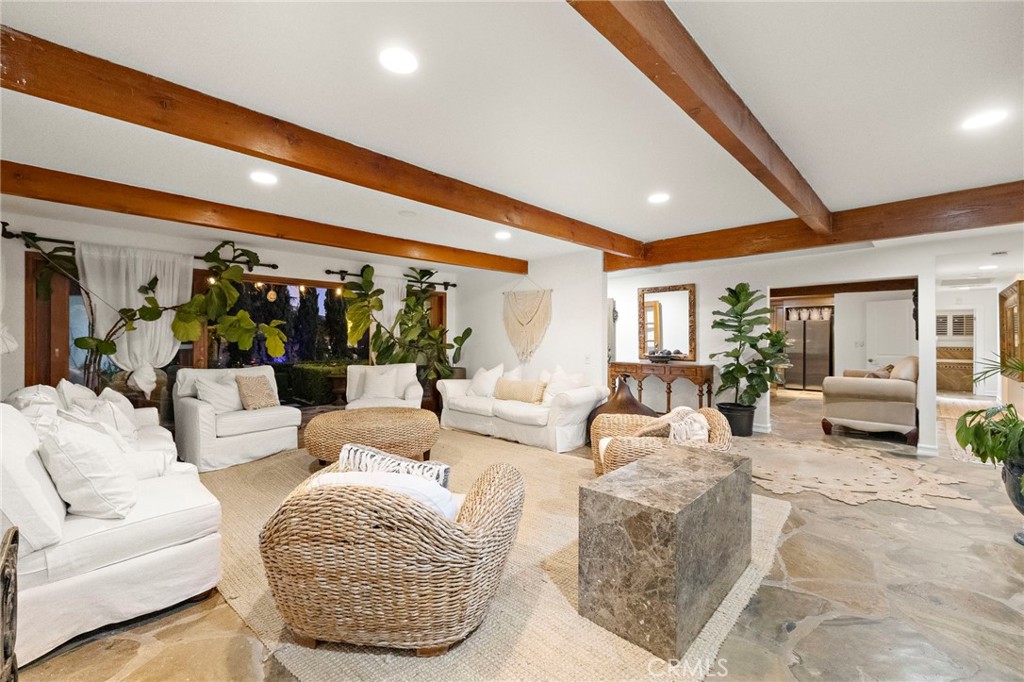 4621 Wayne Road Corona del Mar, CA 92625 - Photo 7 of 26 a living room with furniture and a large window