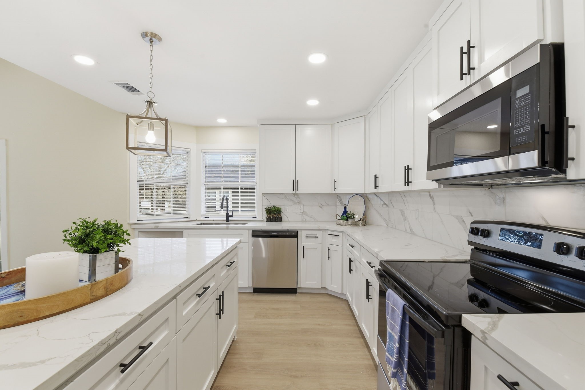 900 Cedar Road Clear Lake Shores, TX 77565 - Photo 12 of 37 Counters and cabinets galore.