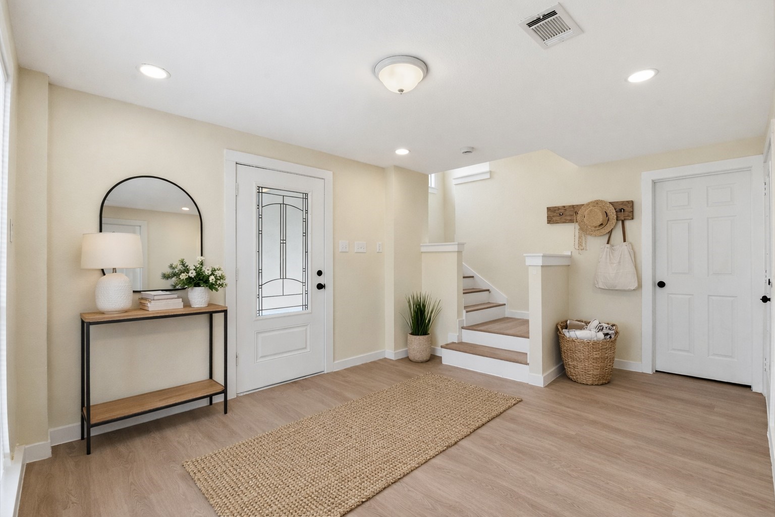 900 Cedar Road Clear Lake Shores, TX 77565 - Photo 5 of 37 The entry hall has a large storage closet below the stairs that could be modified into a half bath.