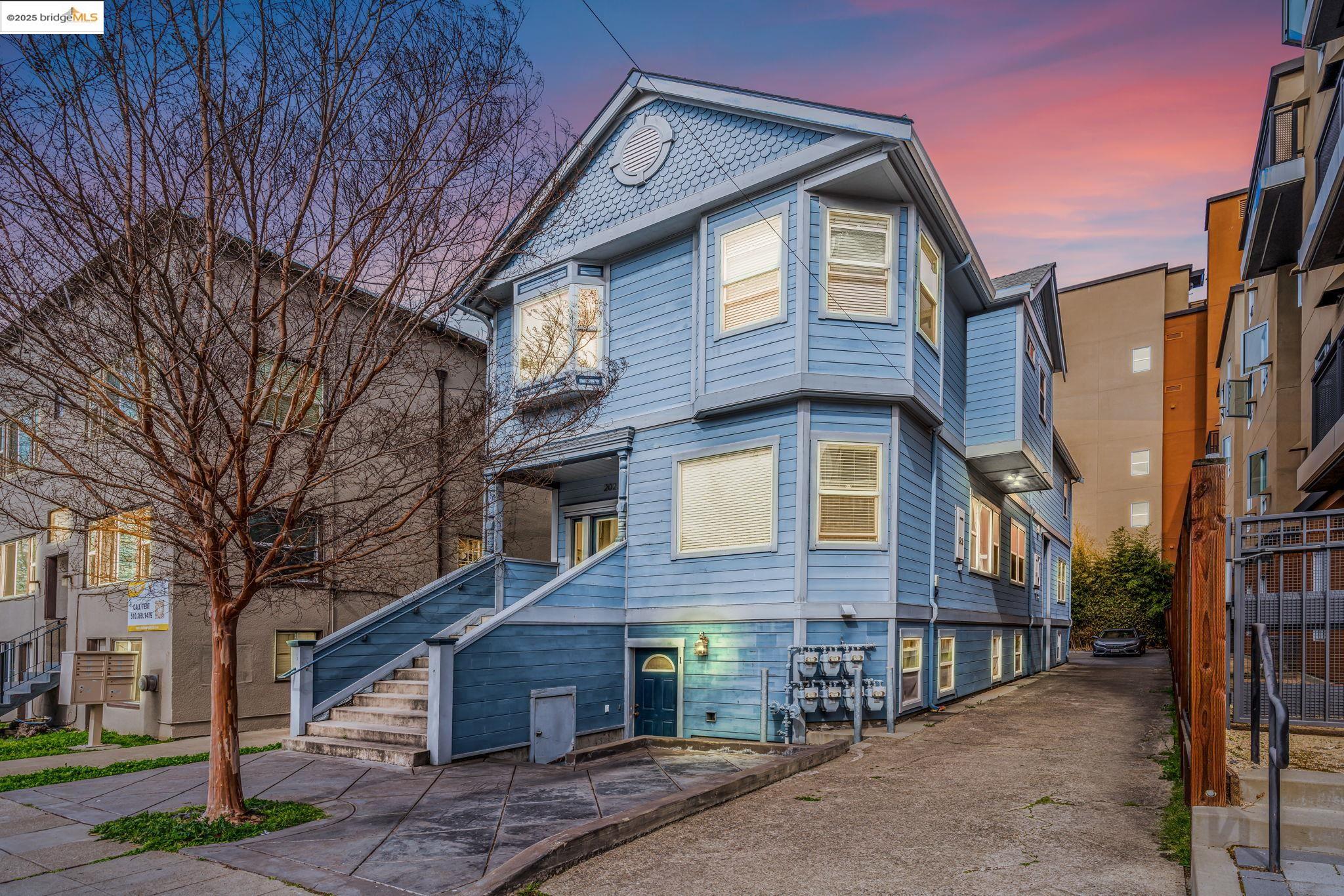 2023 Channing Way Berkeley, CA 94704 - Photo 1 of 14 a front view of a house with a tree