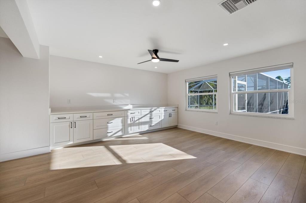 470 Leger Drive Nokomis, FL 34275 - Photo 13 of 51 a view of a room with a window and a ceiling fan