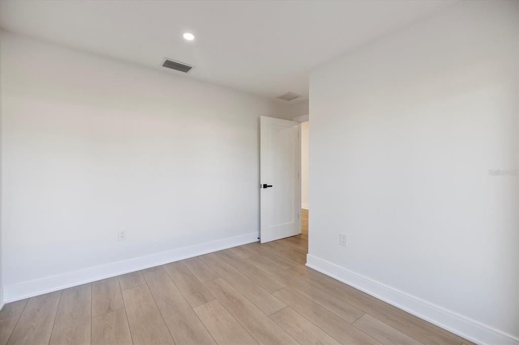 470 Leger Drive Nokomis, FL 34275 - Photo 19 of 51 a view of an empty room