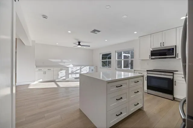 a view of storage and utility room with racks on the wall