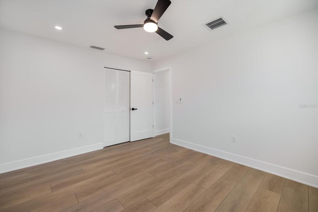 470 Leger Drive Nokomis, FL 34275 - Photo 28 of 51 wooden floor in an empty room