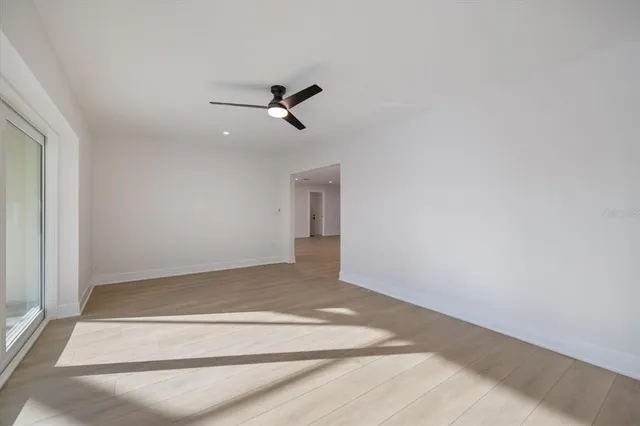 a bathroom with double vanity sink and mirror
