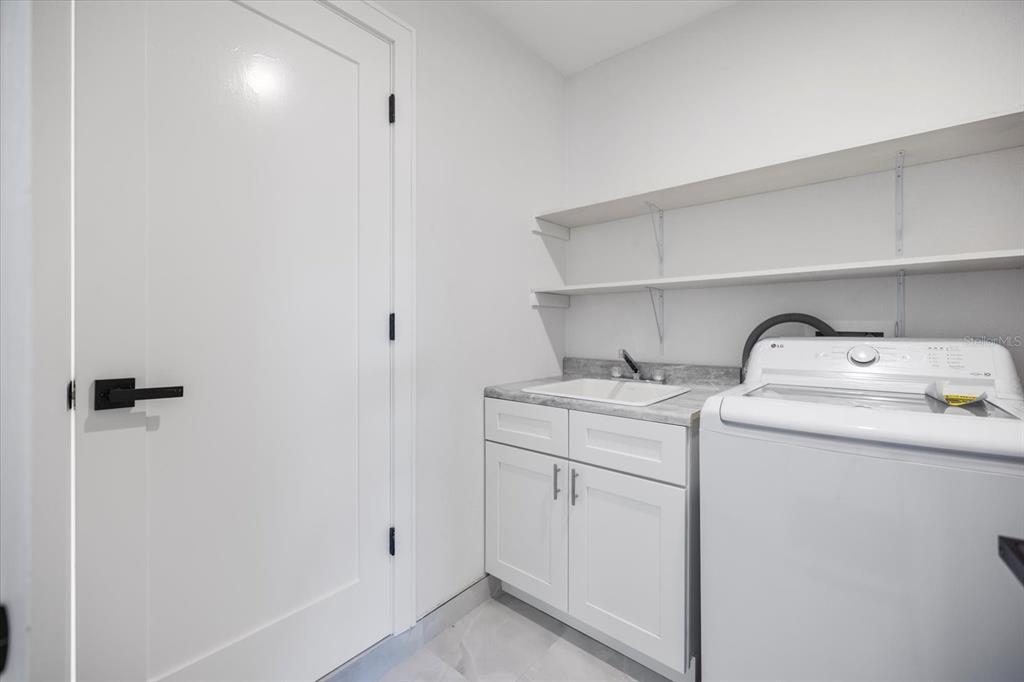 470 Leger Drive Nokomis, FL 34275 - Photo 35 of 51 a utility room with dryer and washer