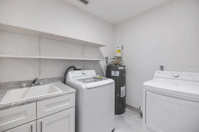 an empty room with white walls