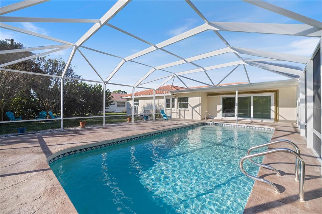 470 Leger Drive Nokomis, FL 34275 - Photo 38 of 51 a view of a backyard with swimming pool