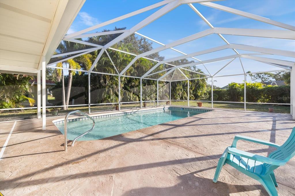 470 Leger Drive Nokomis, FL 34275 - Photo 40 of 51 a view of yard with porch and entertaining space