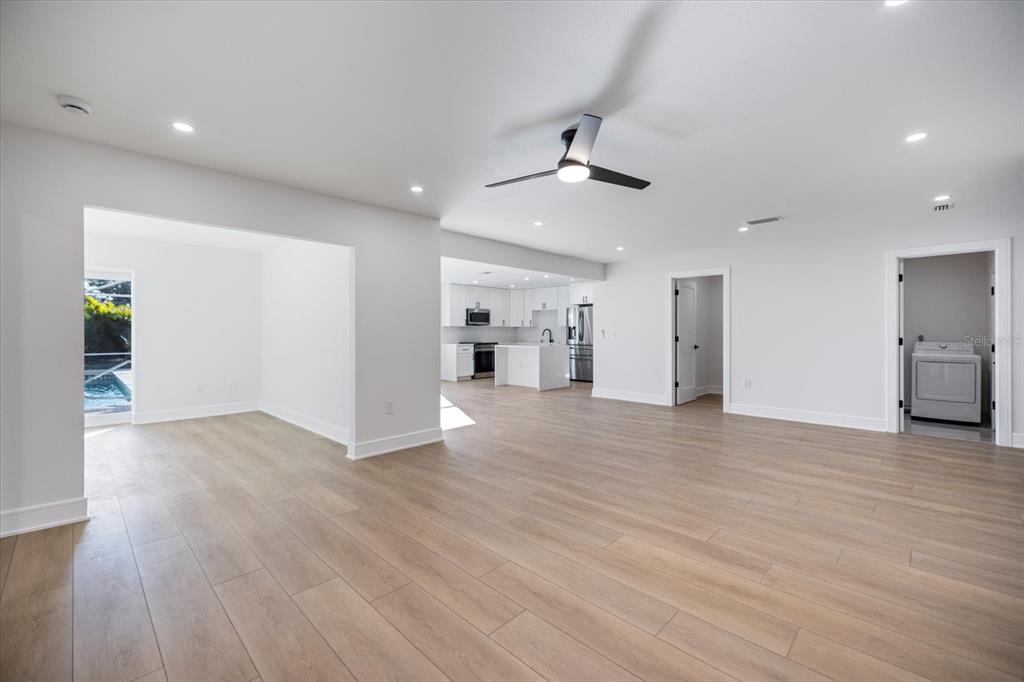 470 Leger Drive Nokomis, FL 34275 - Photo 8 of 51 a view of empty room with wooden floor