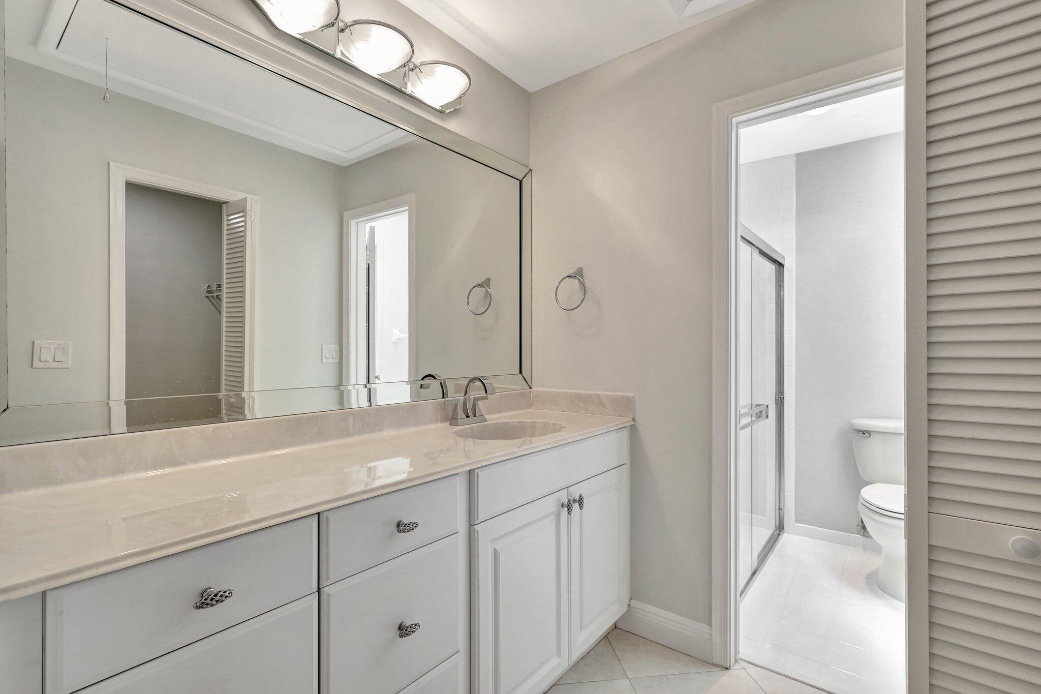 17 Ridge Pointe Drive, Unit A Boynton Beach, FL 33435 - Photo 12 of 29 Primary Bathroom
