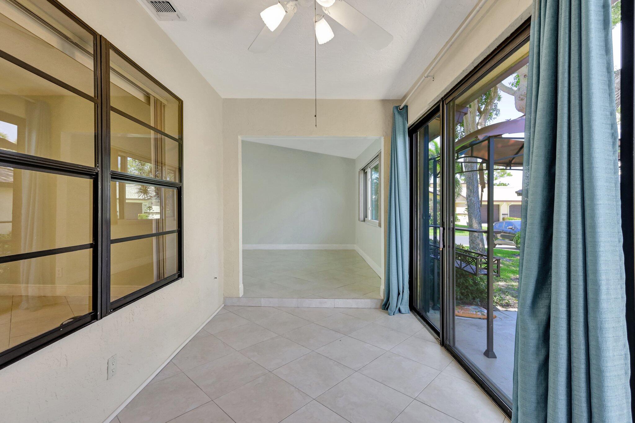 17 Ridge Pointe Drive, Unit A Boynton Beach, FL 33435 - Photo 21 of 29 Sun Room