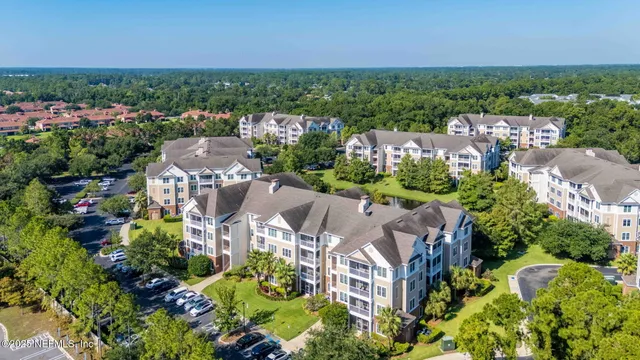 a view of a city with a lake in the background