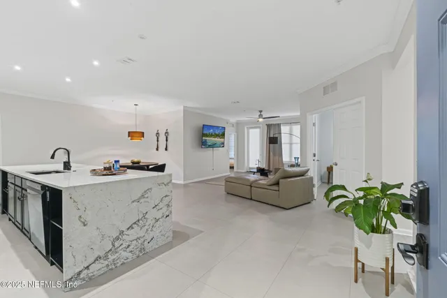 a view of a hallway with entryway door