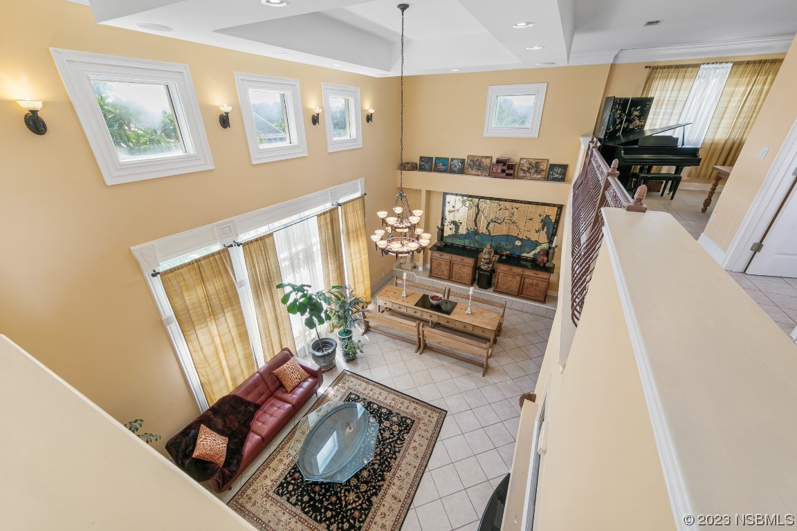 33 Calumet Avenue Ponce Inlet, FL 32127 - Photo 24 of 48 a living room with furniture and a table