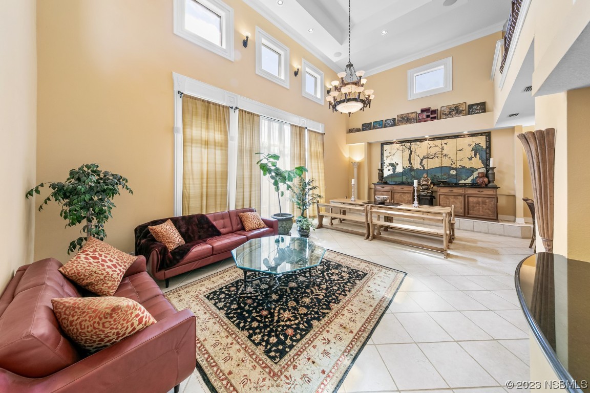 33 Calumet Avenue Ponce Inlet, FL 32127 - Photo 3 of 48 a living room with furniture and a rug