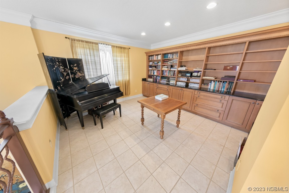 33 Calumet Avenue Ponce Inlet, FL 32127 - Photo 32 of 48 a living room with furniture and a piano