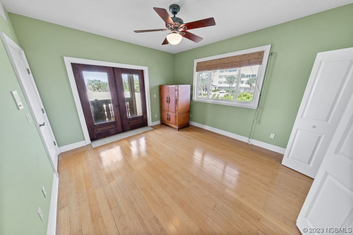 33 Calumet Avenue Ponce Inlet, FL 32127 - Photo 39 of 48 a view of livingroom with hardwood floor and a ceiling fan