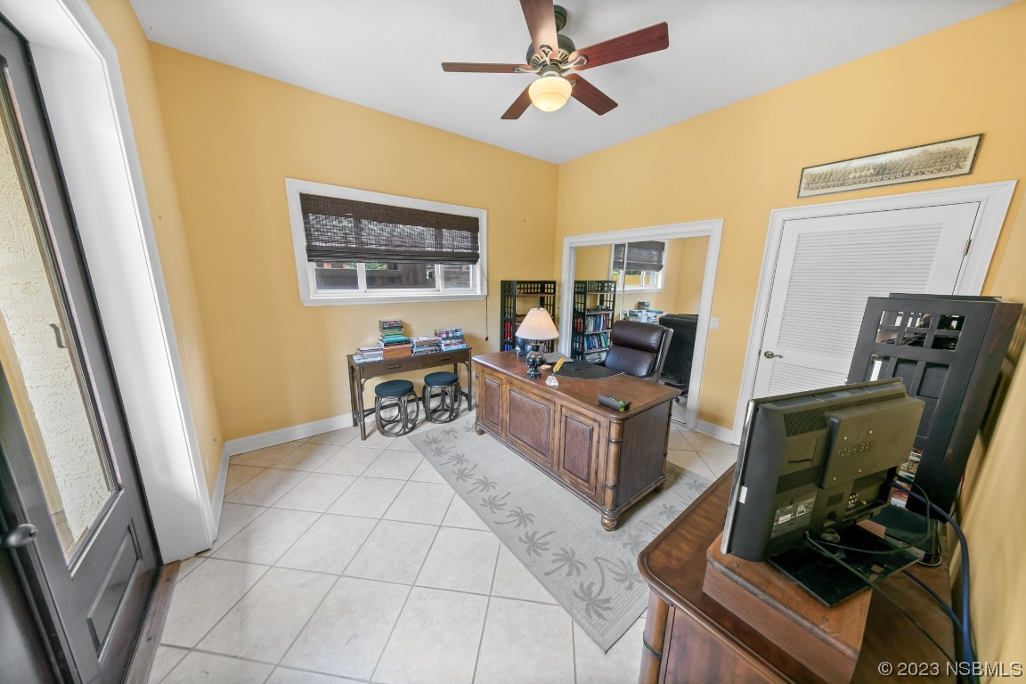 33 Calumet Avenue Ponce Inlet, FL 32127 - Photo 41 of 48 a living room with furniture and a flat screen tv