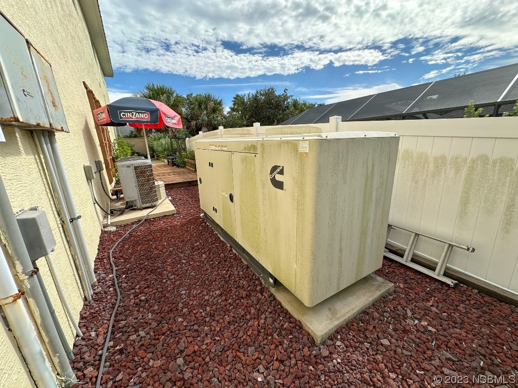 33 Calumet Avenue Ponce Inlet, FL 32127 - Photo 45 of 48 a view of a backyard with sitting area