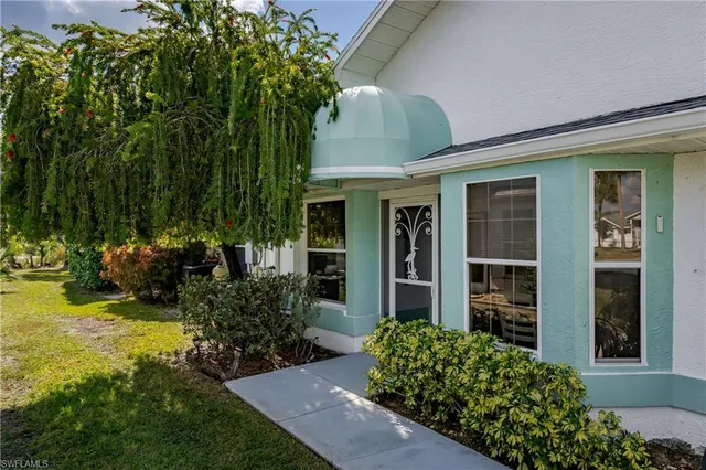 $274,900 | 1933 Golfside Village Drive, Lehigh Acres, FL 33936