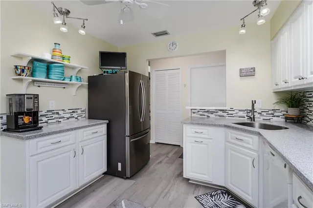 $274,900 | 1933 Golfside Village Drive, Lehigh Acres, FL 33936