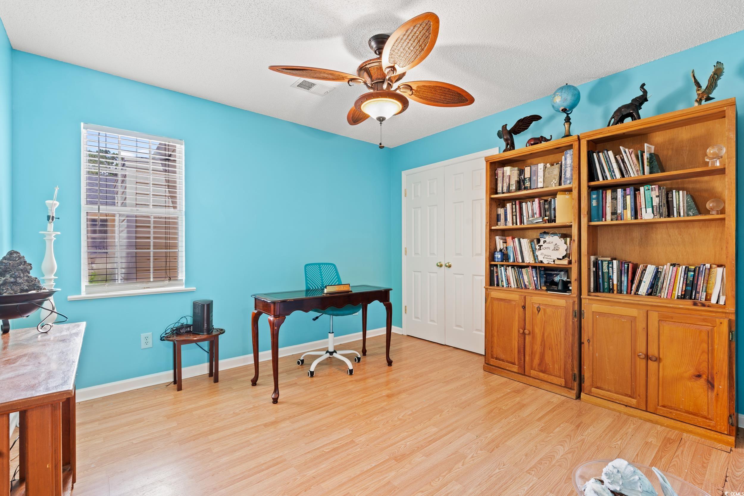 3056 Sweetpine Lane Conway, SC 29527 - Photo 20 of 36 Office area with light wood-style flooring, a textured ceiling, and ceiling fan
