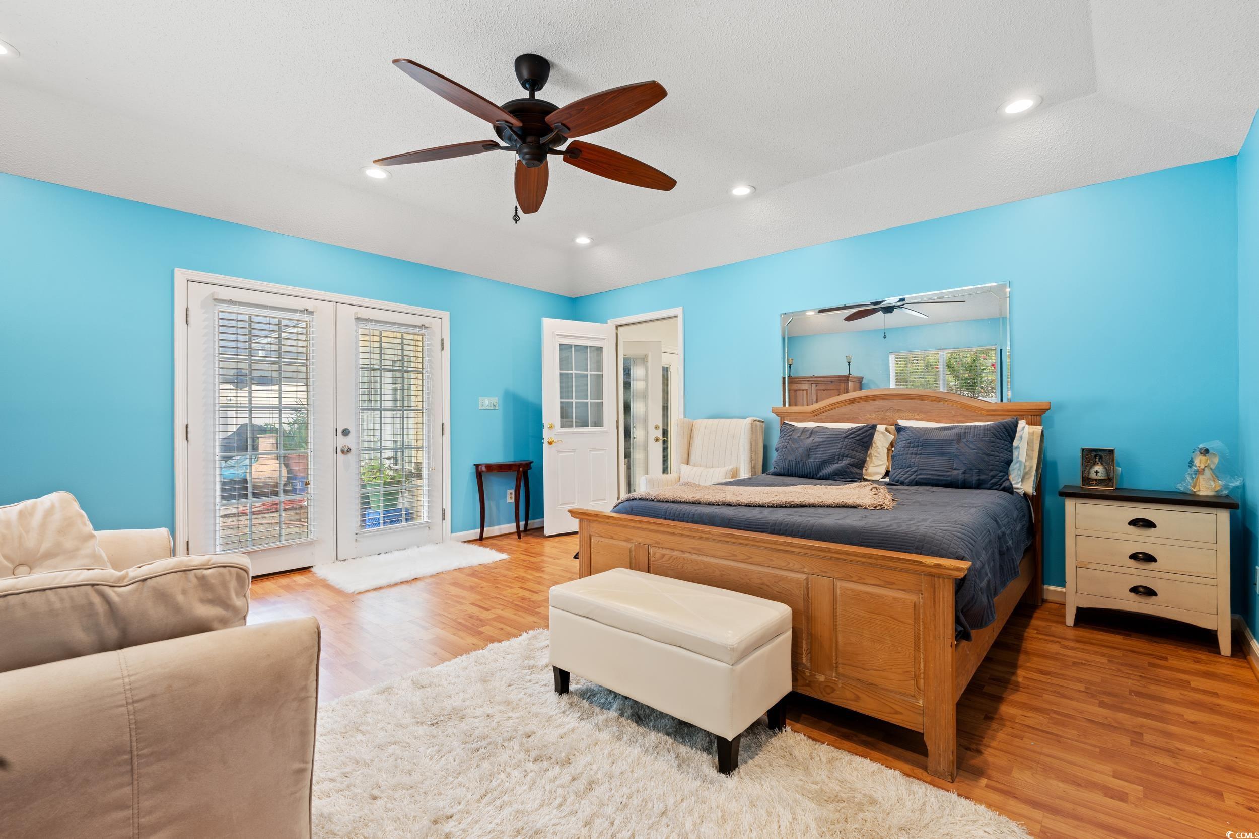 3056 Sweetpine Lane Conway, SC 29527 - Photo 29 of 36 Bedroom with access to outside, light wood-style floors, a ceiling fan, recessed lighting, and french doors