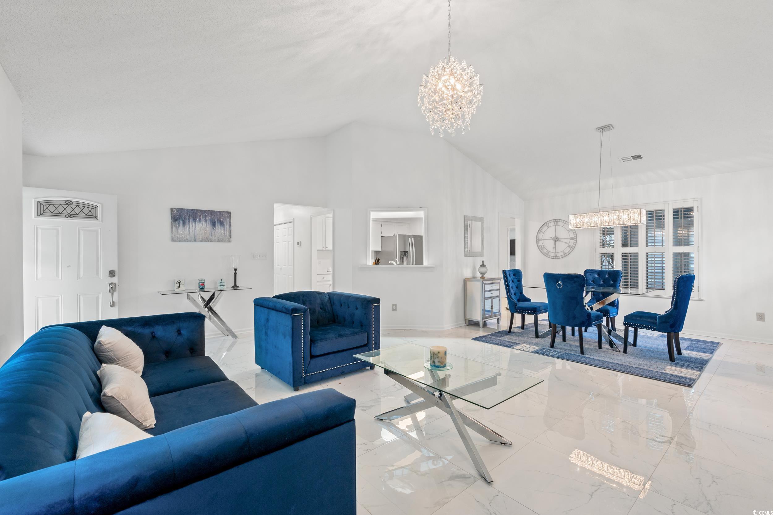3056 Sweetpine Lane Conway, SC 29527 - Photo 6 of 36 Living room with a chandelier, marble tiled flooring, and high vaulted ceiling