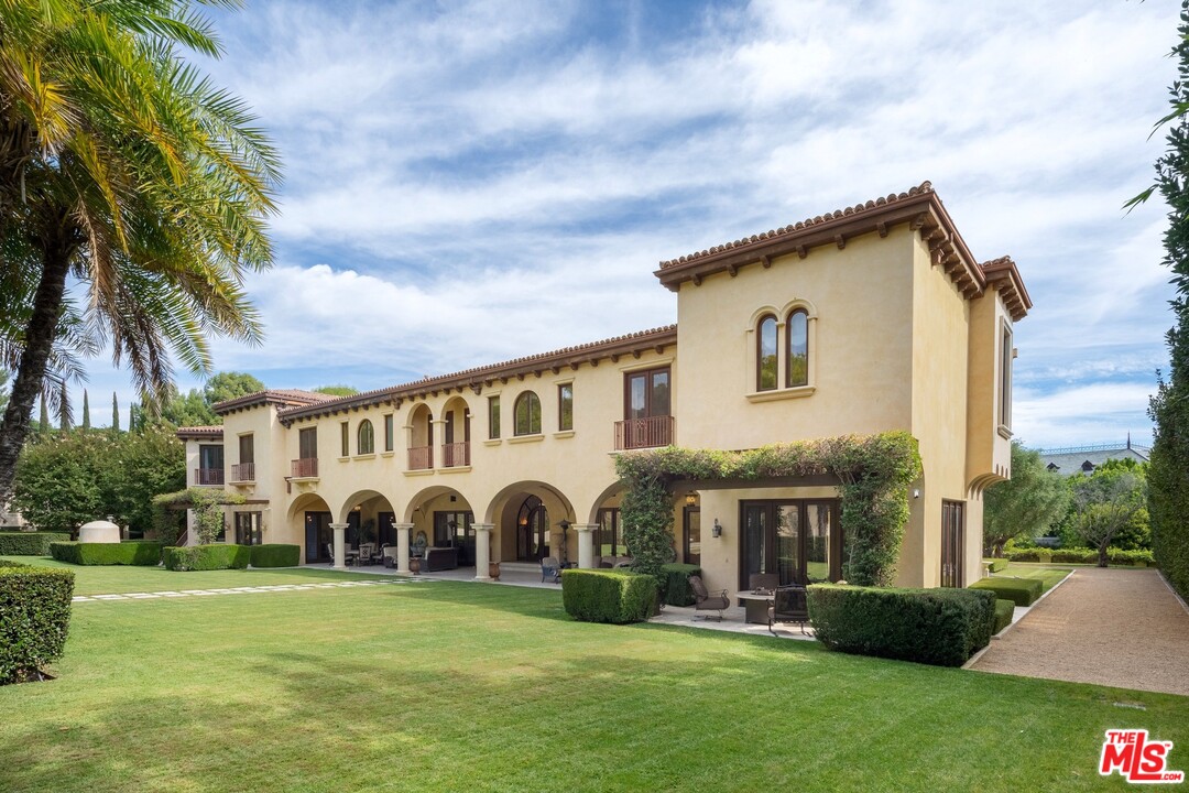 44 Beverly Park Circle Beverly Hills, CA 90210 - Photo 9 of 17 a front view of house with yard and green space
