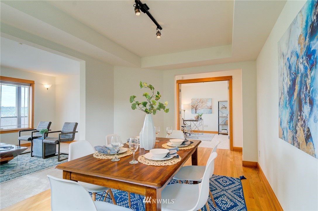 6734 Mars Avenue South Seattle, WA 98108 - Photo 13 of 40 a dining room with furniture and wooden floor