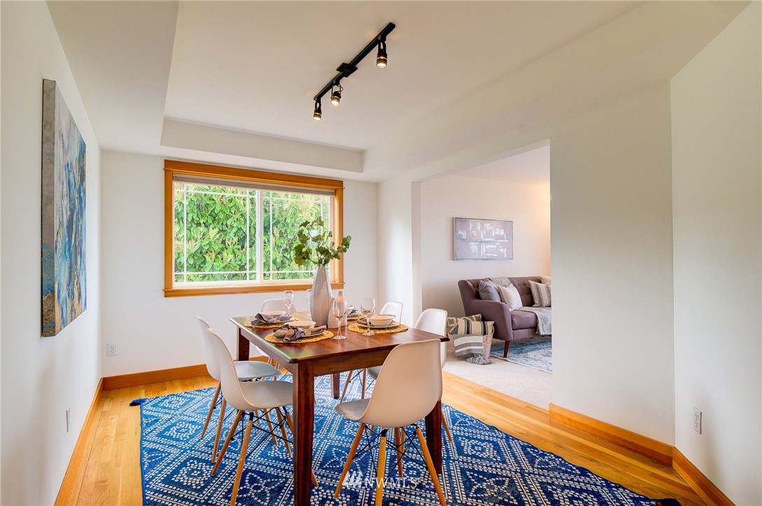 6734 Mars Avenue South Seattle, WA 98108 - Photo 14 of 40 a dining room with furniture and a window