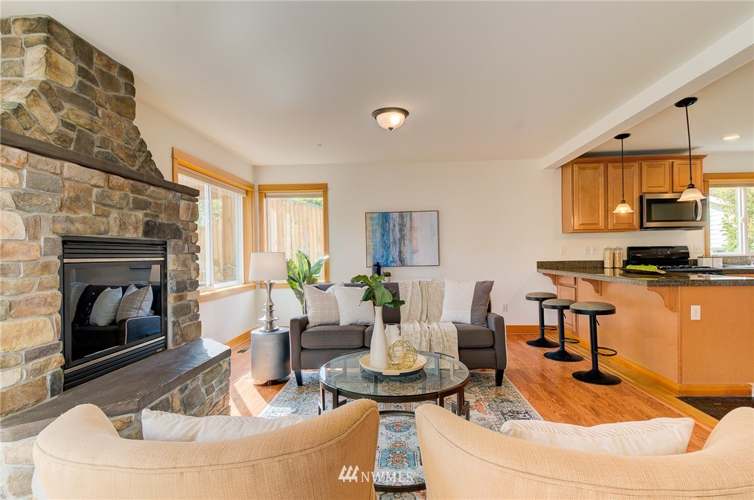6734 Mars Avenue South Seattle, WA 98108 - Photo 18 of 40 a living room with fireplace furniture and a fireplace