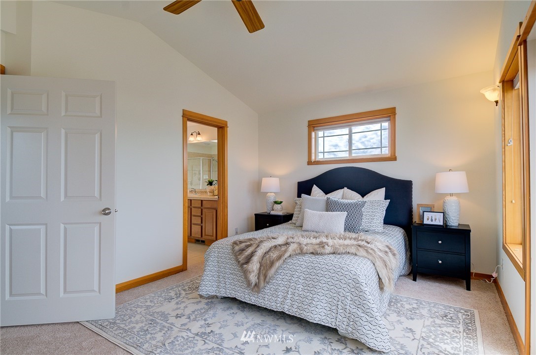 6734 Mars Avenue South Seattle, WA 98108 - Photo 28 of 40 a bedroom with a bed and a window