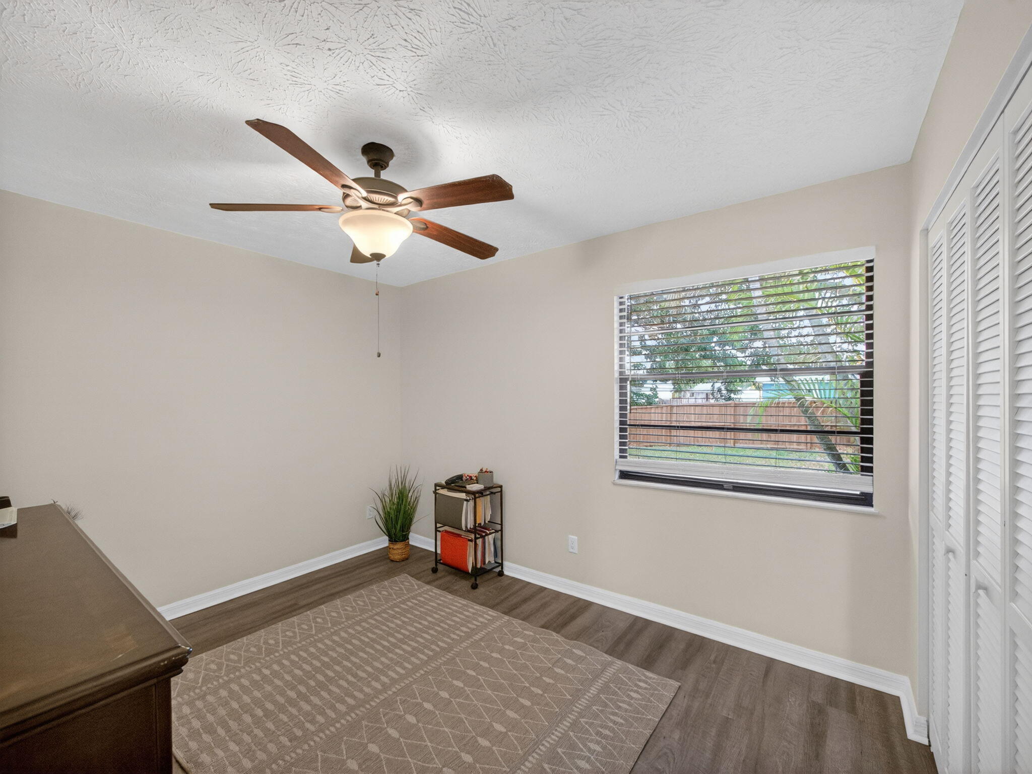 991 Northwest 15th Terrace Stuart, FL 34994 - Photo 16 of 24 a view of an empty room with a window