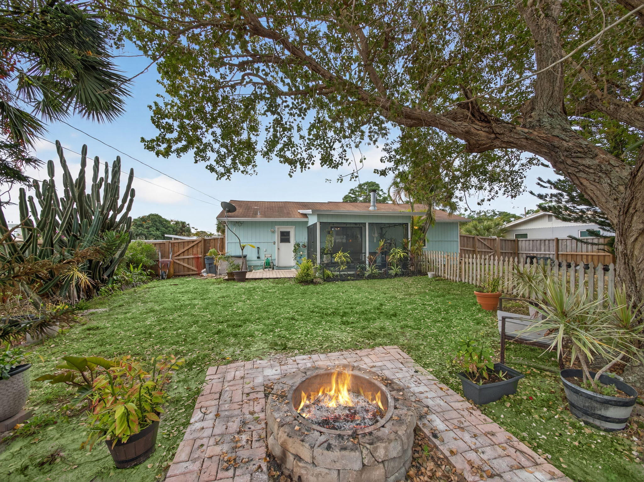 991 Northwest 15th Terrace Stuart, FL 34994 - Photo 21 of 24 a view of a house with a backyard